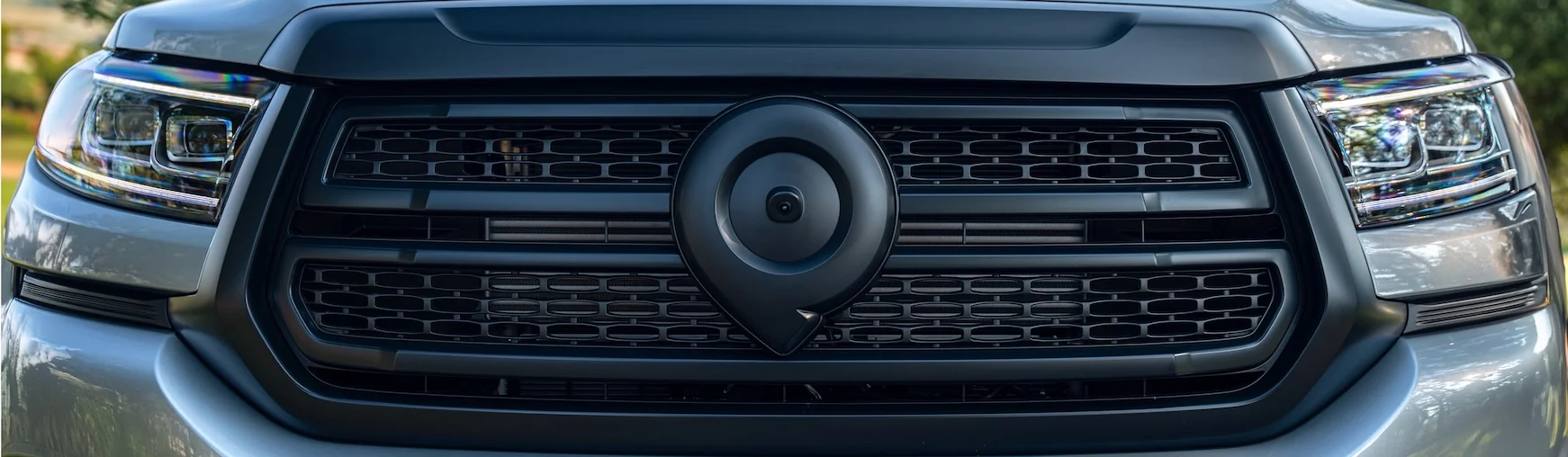 Bold black front grille